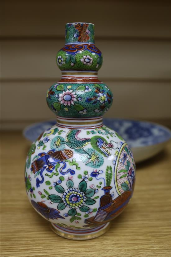 A Chinese enamel vase and two Chinese dishes